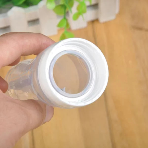 Silicone Baby Spoon Feeder Bottle – Safe & Easy Squeeze Feeding